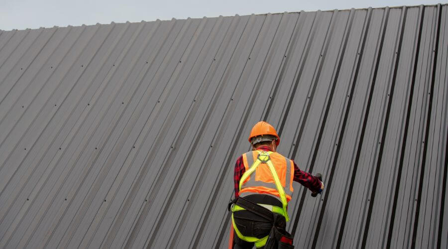 Professional metal roof installation services in Roxana, IL